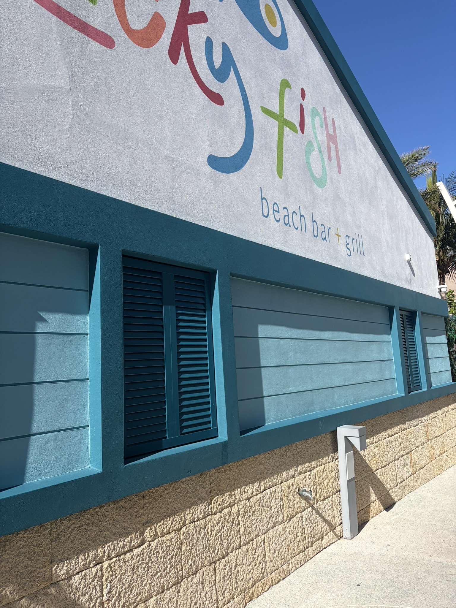 Beachfront restaurant exterior after pressure wash, Lighthouse Point