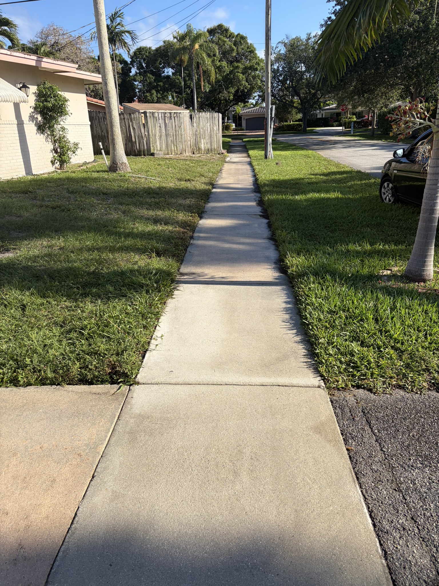 Concrete walkway curb-to-door pressure wash, Coconut Creek